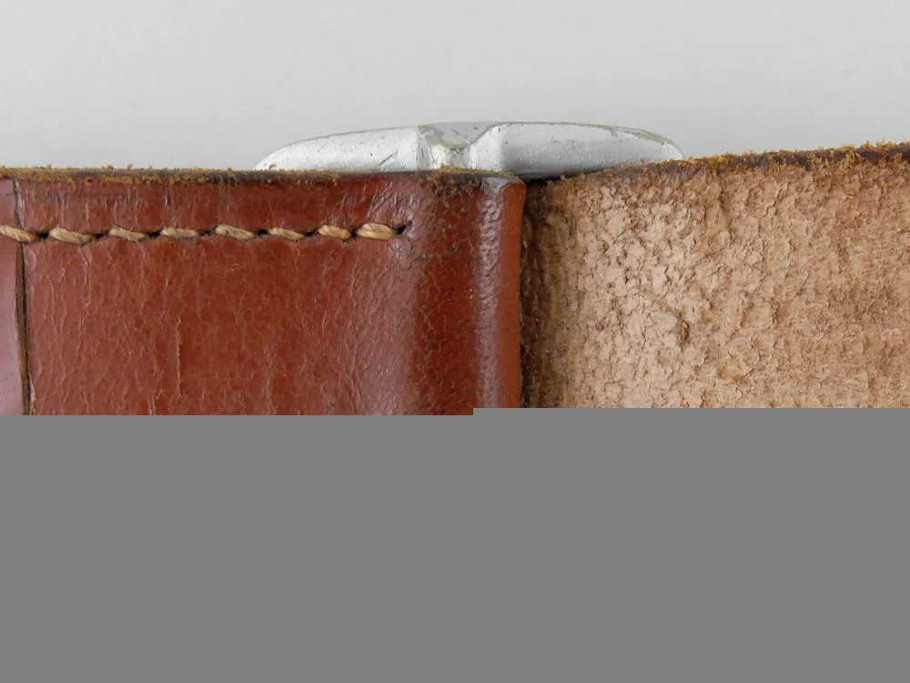A Brown Leather Shoulder Strap; Rzm Marked