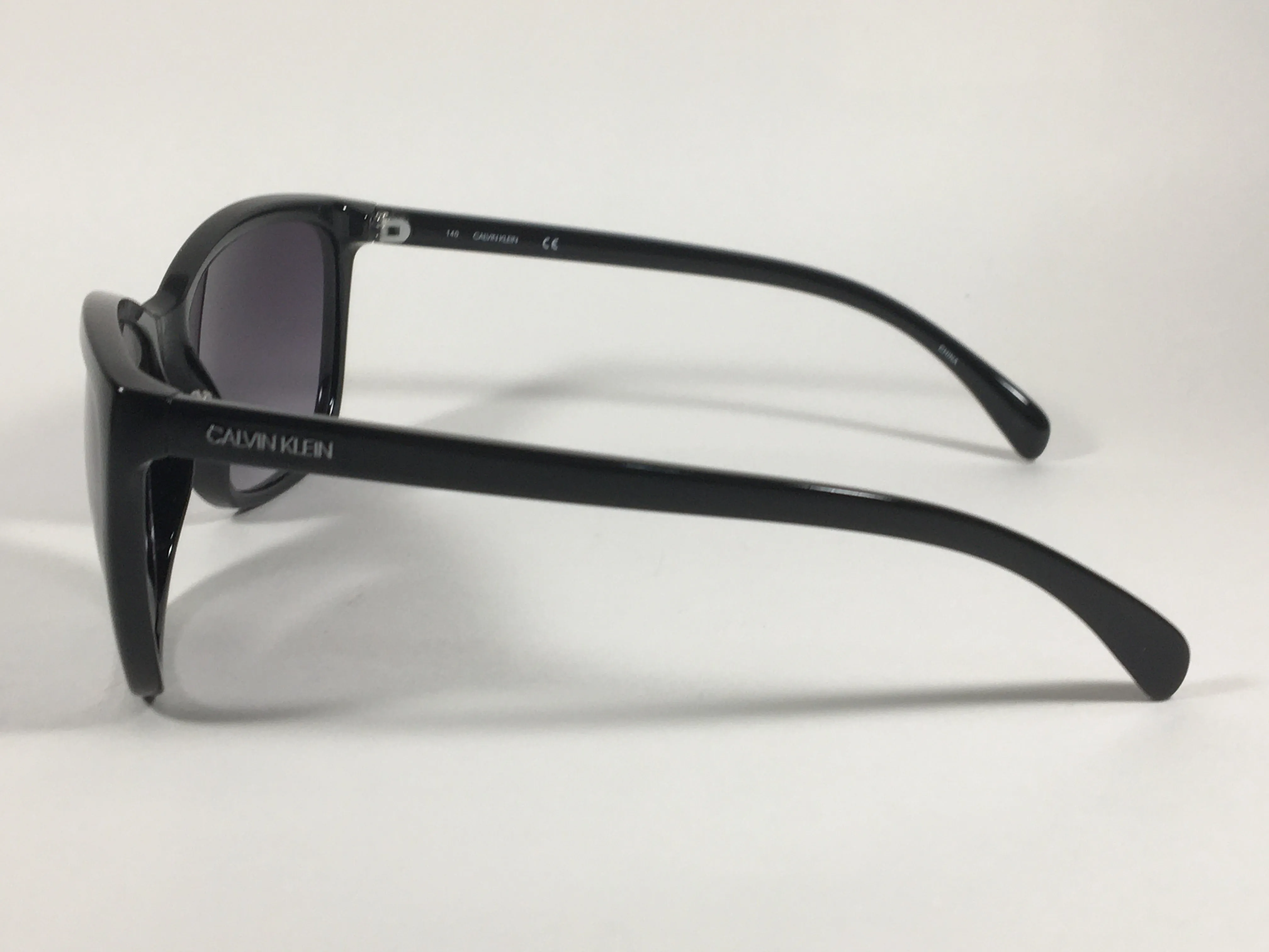 Calvin Klein Cat Eye Sunglasses CK19565S 001 Black Gloss Smoke Gradient Lens