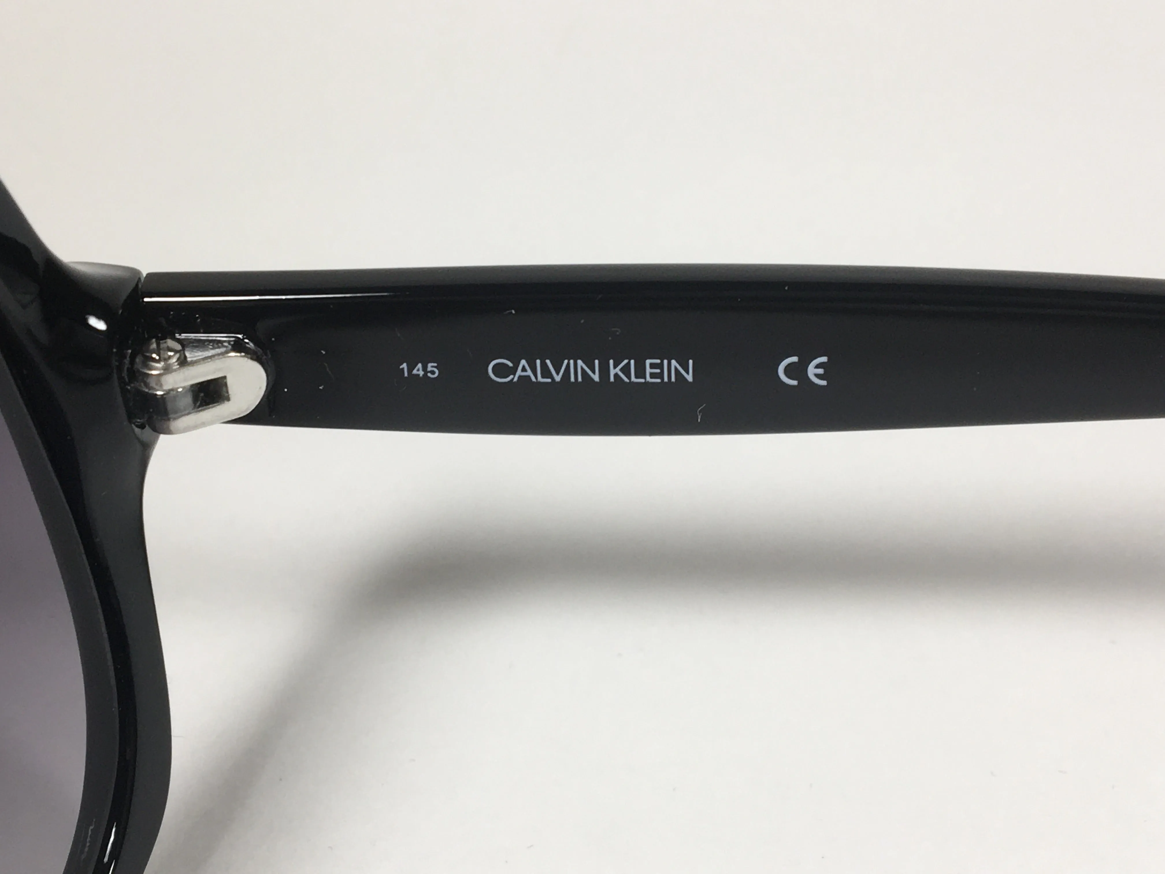 Calvin Klein Oversize Sunglasses CK19538S 001 Black Gloss Frame Smoke Gradient Lens
