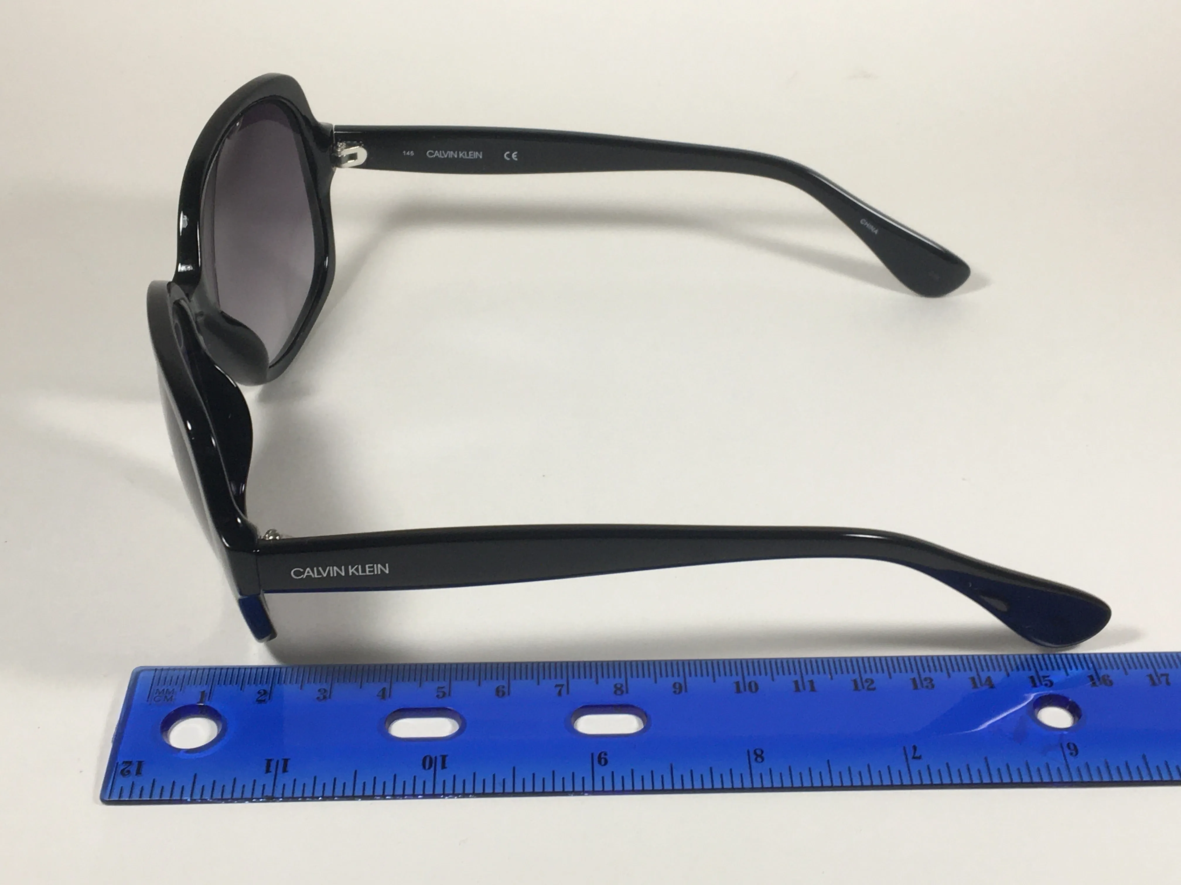 Calvin Klein Oversize Sunglasses CK19538S 001 Black Gloss Frame Smoke Gradient Lens