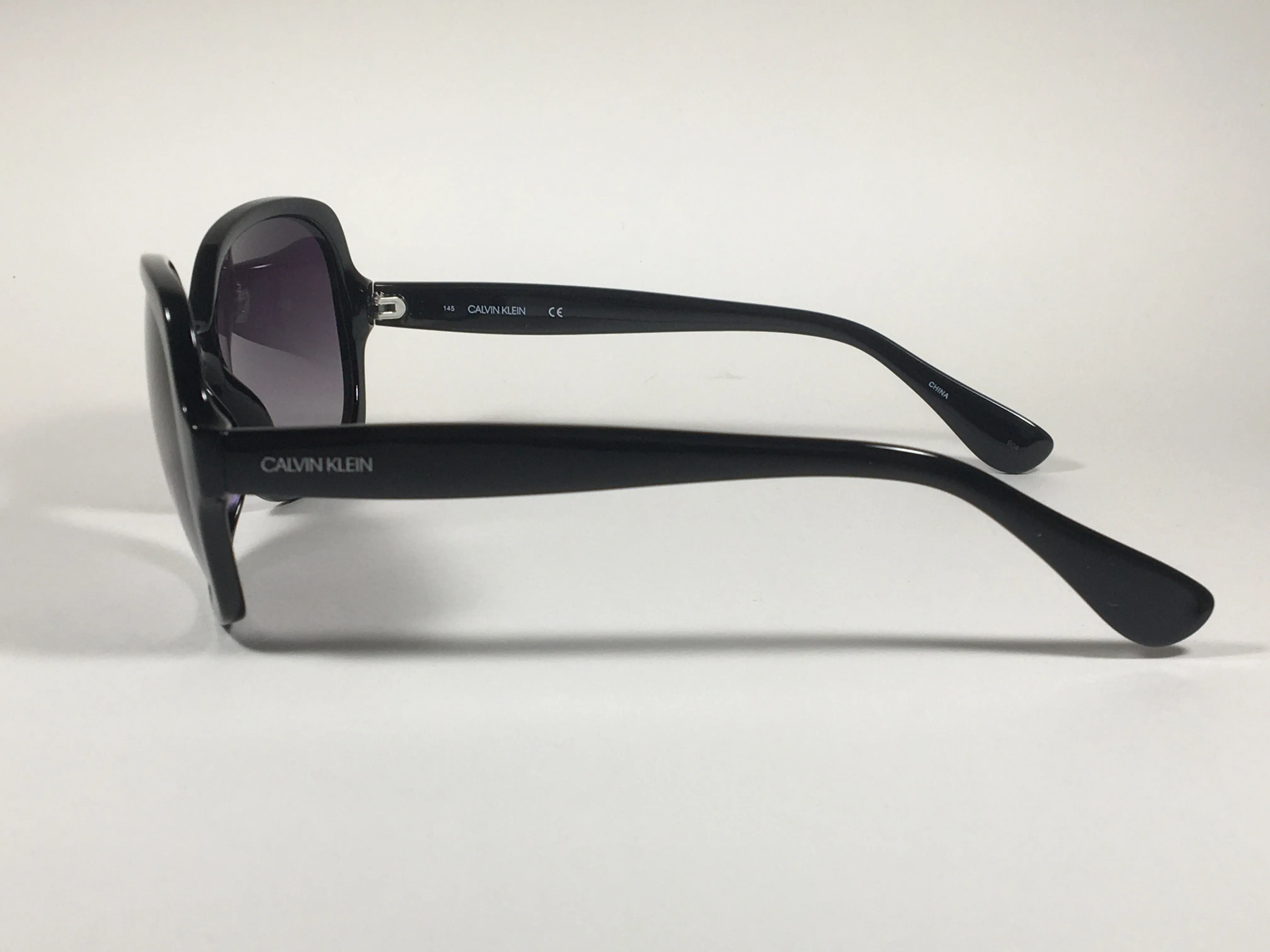 Calvin Klein Oversize Sunglasses CK19538S 001 Black Gloss Frame Smoke Gradient Lens