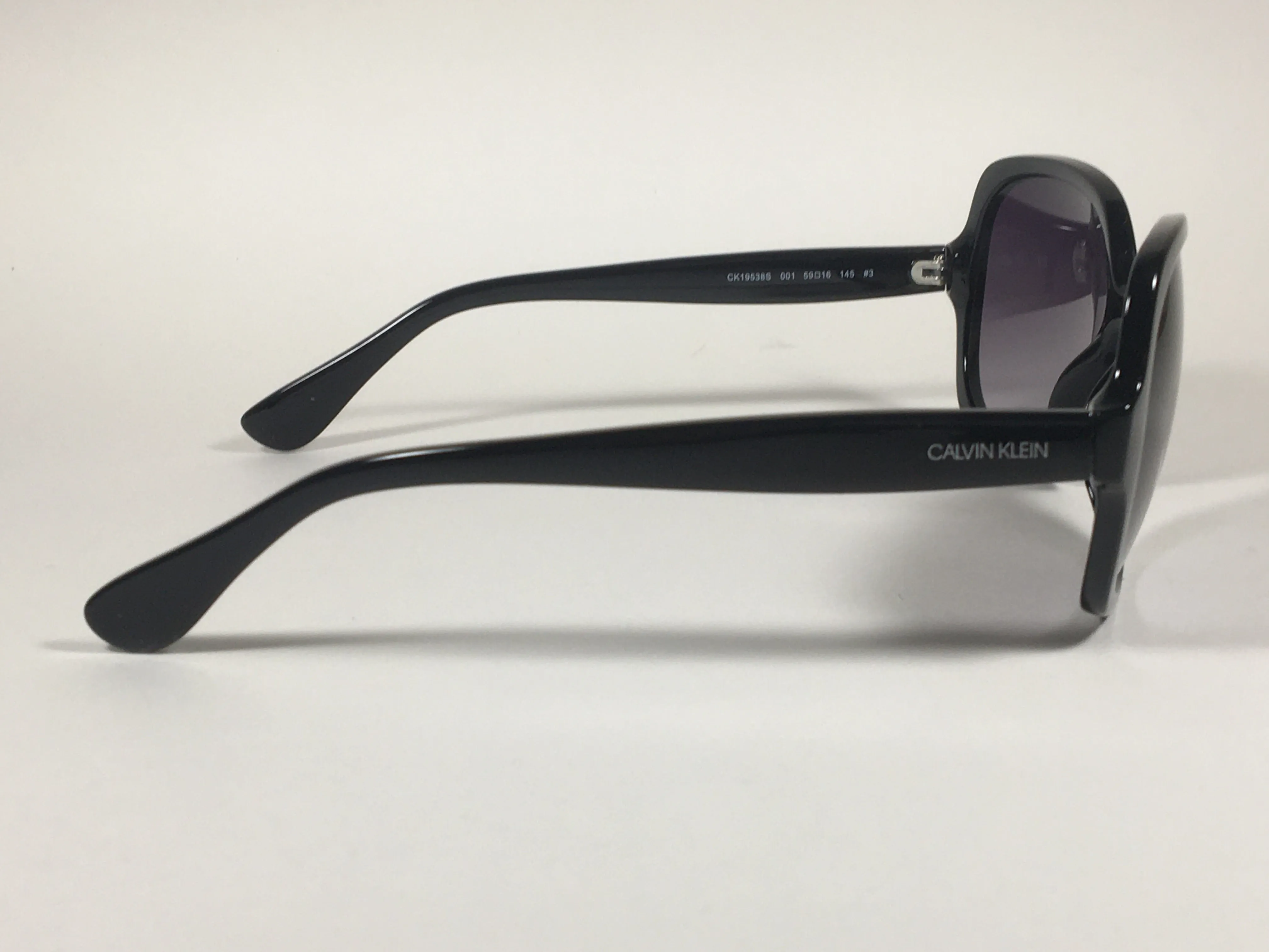 Calvin Klein Oversize Sunglasses CK19538S 001 Black Gloss Frame Smoke Gradient Lens