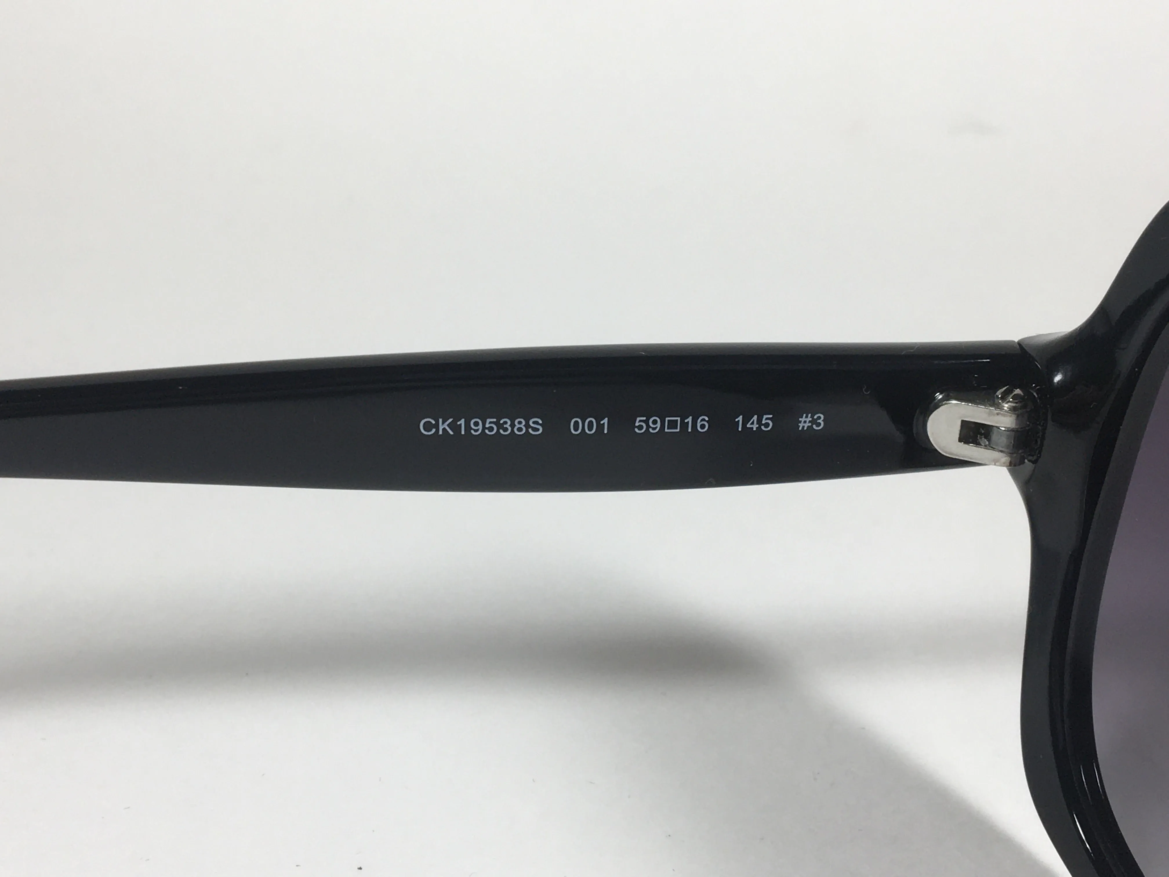 Calvin Klein Oversize Sunglasses CK19538S 001 Black Gloss Frame Smoke Gradient Lens
