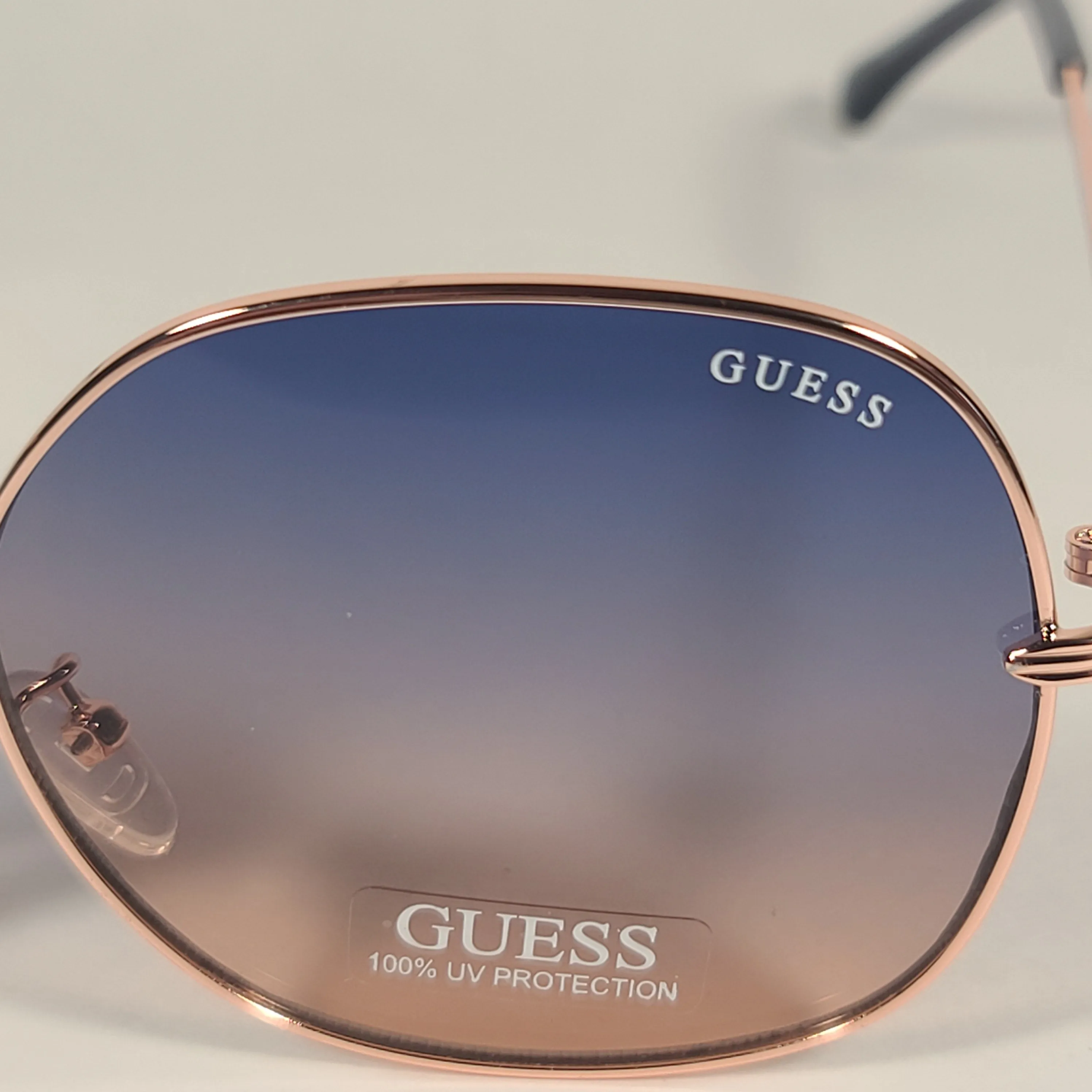 Guess Butterfly Sunglasses Rose Gold Frame Blue Gradient Lens GF0385 28W