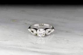 Late Art Deco/ Mid Century Platinum Engagement Ring with "Buckle-and-Clasp" Shoulders