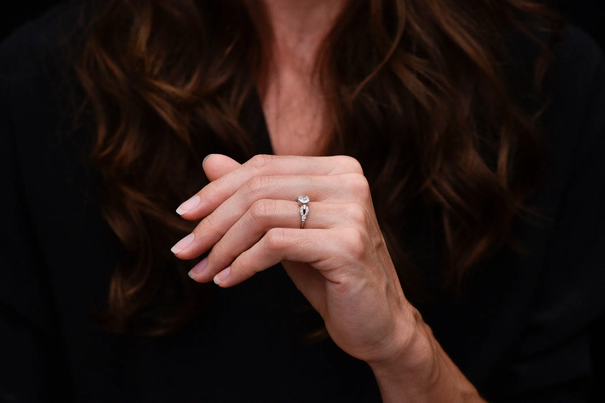 Late Art Deco/ Mid Century Platinum Engagement Ring with "Buckle-and-Clasp" Shoulders